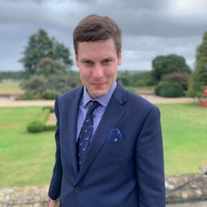 Chris Webb in suit outside