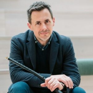 Gawain Glenton seated, with cornett