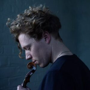 Max Baillie with violin