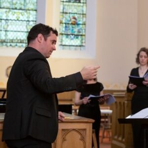 Nicholas Mulroy conducting Dunedin Consort