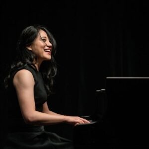 Zee Zee playing the piano